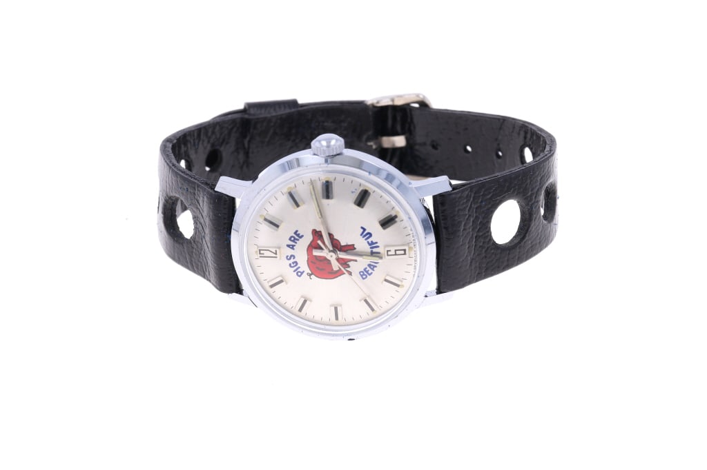 "Pigs Are Beautiful" G.T.M. Watch & Case 1970: For your consideration is this "Pigs Are Beautiful" G.T.M. wrist watch with original case from 1970. This watch shows a silver face and and an image of a red pig with lettering reading, "Pigs Are Beau