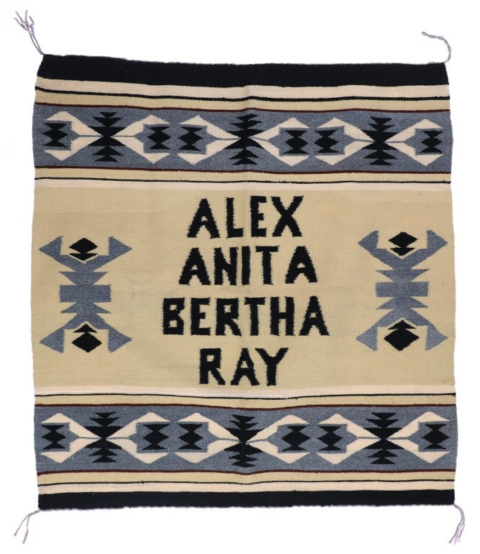 Vintage Navajo Wide Ruins Chinle Hand Woven Rug: The lot features a fantastic Vintage Navajo Wide Ruins Chinle hand woven rug from circa 1960's. The rug shows a banded Chinle Wide Ruins design with sampler family names at the center marked, Alex ? A
