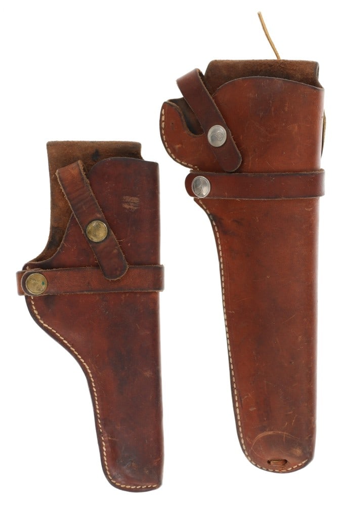 Hunter 1100 Series Holsters Model 37 & 50: Included in this lot are Hunter 1100 Series Holsters (2), size 37, circa 1950s and size 50, circa late century. These are classic American full-grain leather holsters designed primarily for revolvers,
