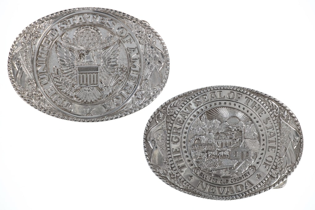 Tony Lama Collection State Series Belt Buckles (2): Featured in this lot are two, solid silvered brass Tony Lama Collection "State Series" belt buckles from the late 20th century. Tony Lama Sr., a U.S. Cavalry cobbler, founded Tony Lama Boots in El Pas