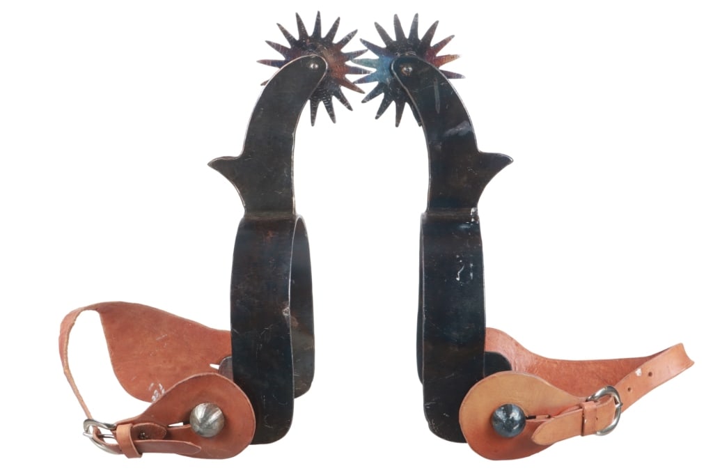 ca. 1940-50 Spur & Saddlery Oversized Sign Spurs: The lot features a set of oversized trade sign advertising spurs, handmade circa 1940-1950’s with a case colored blue finish from a Spur and Saddlery Mercantile shop. These would have been placed in