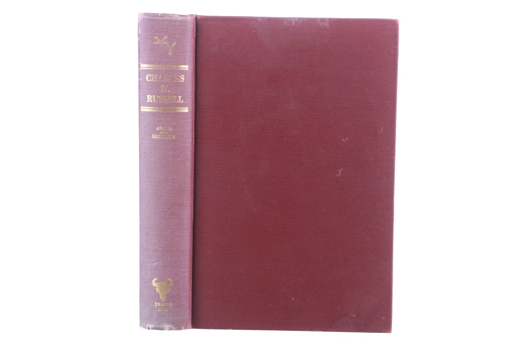 1948 1st Ed. Charles M Russell by Adams & Britzman: Featured in this lot is this 1948 first edition of Charles M. Russell The Cowboy Artist A Biography by Ramon F. Adams and Homer E Britzman with Bibliographical Check List by Karl Yost. The book is a b