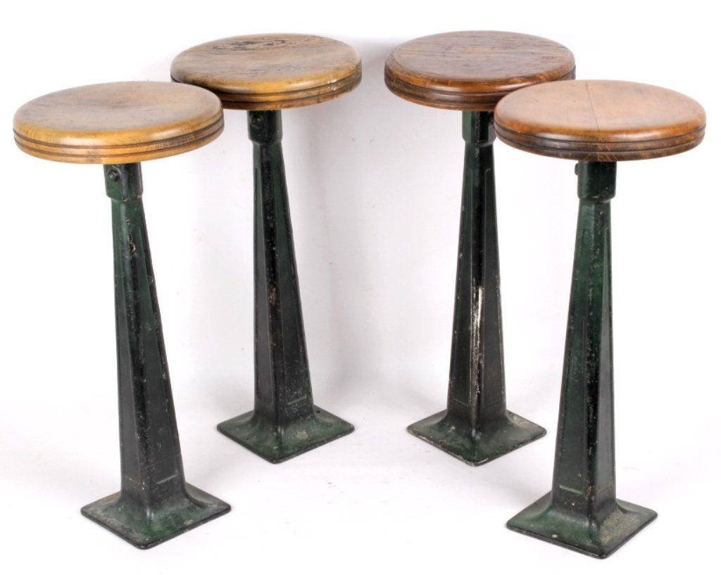 Antique Bar Stools from Cripple Creek Colorado: This is a collection of four bar stools made of cast iron and wood. These feature a swivel top made of solid wood with a great wear and has a wonderful dark green color and design. These are all in go