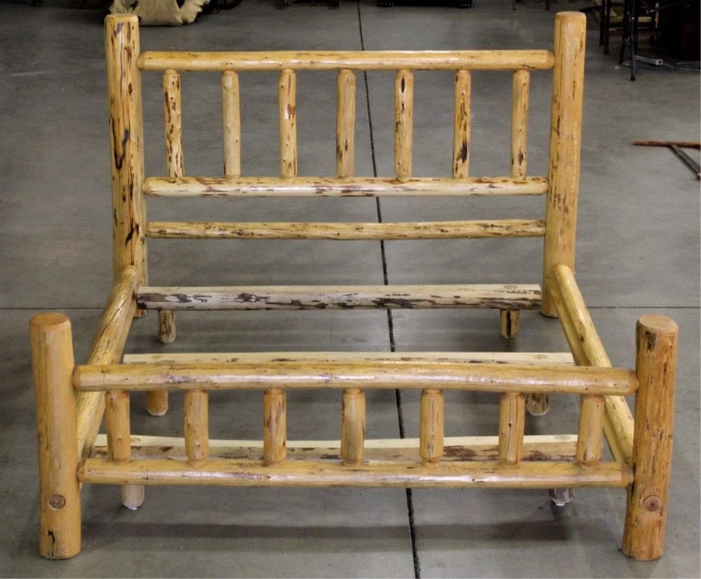 Rustic Log Bed: This is a California King Bed frame that includes entire bed and three support beams. This bed is in great condition and has a wonderful rustic look. The bed frame measures 93" long and 81.5" wide wit
