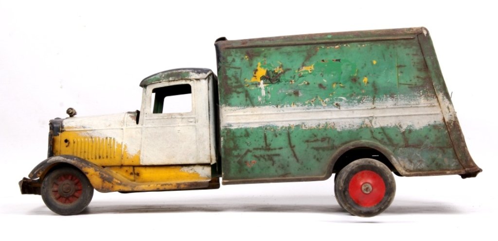 Buddy L Toy Truck: This is a rare old Buddy L truck of an early 1930-1940's style delivery or box truck. This has a great various of colors from black, green, yellow, and white. This truck in good condition books for $2