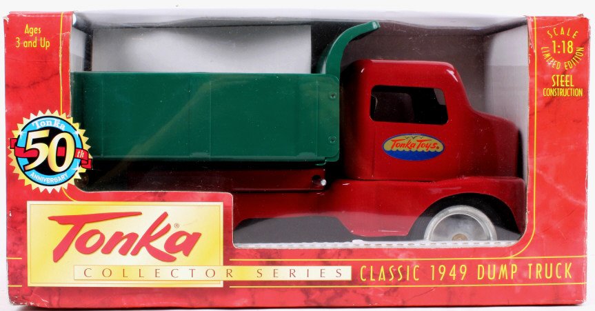 Tonka 1949 Pressed Steel Dump Truck: This is a 50th Anniversary pressed steel truck in mint condition in the original box unopened. The box measures 6.75"x13.5"