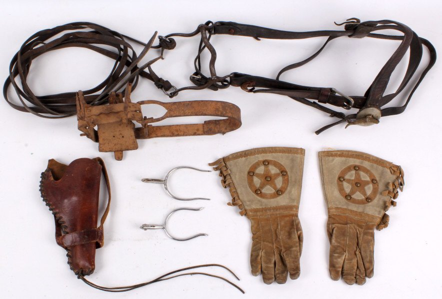 Antique Cowboy Western Collection: This lot features a hand forged antique trap, early small spurs, hand tooled leather holster, leather gloves, and an early horses bridle with conchos and a civil war cavalry bit with worn off insignia