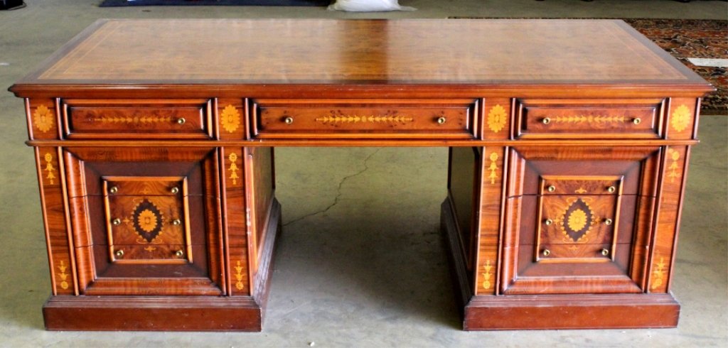 Burl Inlay Wood Partners Desk: This piece shows wonderful craftsmanship having burl inlay and overlay across the entire piece. The back of the desk is missing a board. This desk has gliding drawers and is an impressive piece. Measu