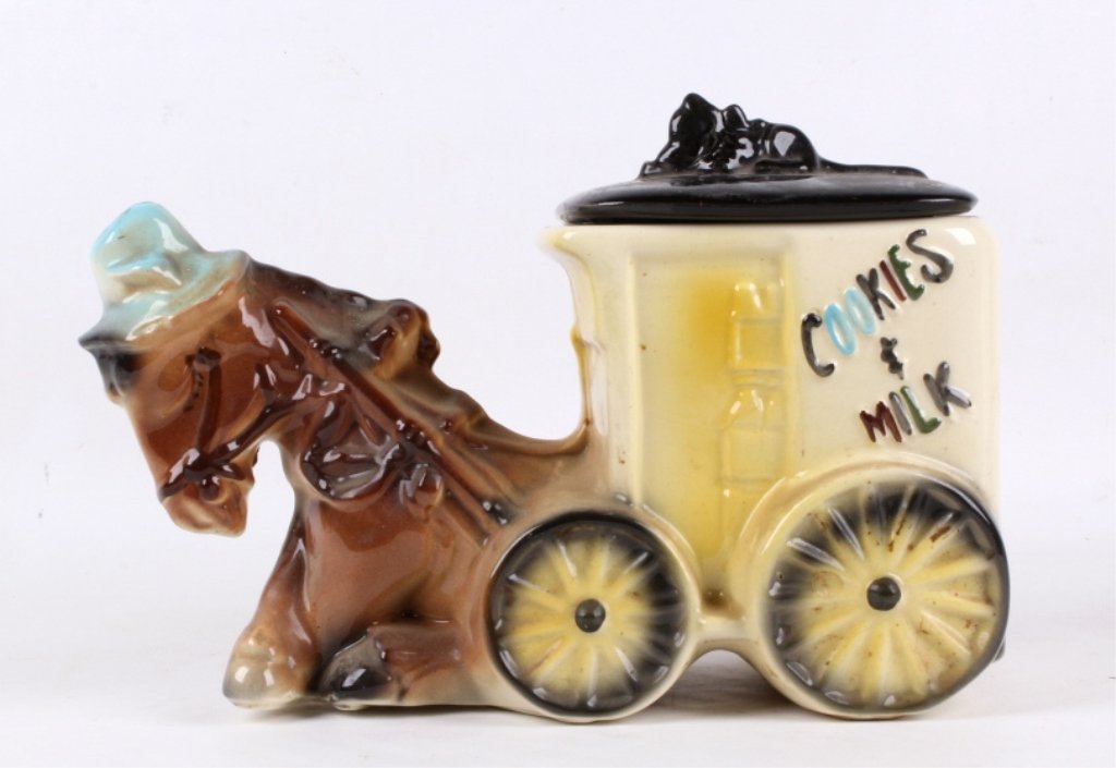 Vintage Cookie jar: This is a Horse and Milk Carriage with the lid. This is in good condition and is marked USA 740. Measures 12.5" l x 8.75" t