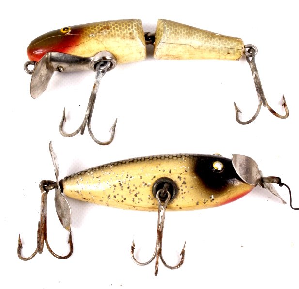 2 Paw Paw Lures: Injured & Jointed Minnow: This lot features two lures from the 1930-1940's made by Paw Paw. This includes the Injured Minnow and Baby Jointed Minnow with Pointed Eyes. The largest measures 5" long.