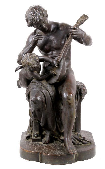 Copper Patina Sculpture of Apollo and Cherub: This piece is made of a stone or similar material casting with an overlaid copper giving it a wonderful look. This is in good condition with many great details and features a man holding a mandolin wi
