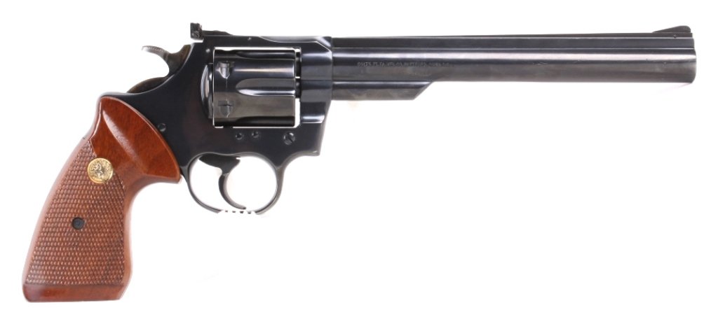 Colt Trooper Mark III .22 LR Revolver: This is a genuine Colt Trooper Mark III .22 Long Rifle Caliber six shot double action revolver. This is in mint condition with beautiful blueing and mint checkering wood grips. This features the 8" ba