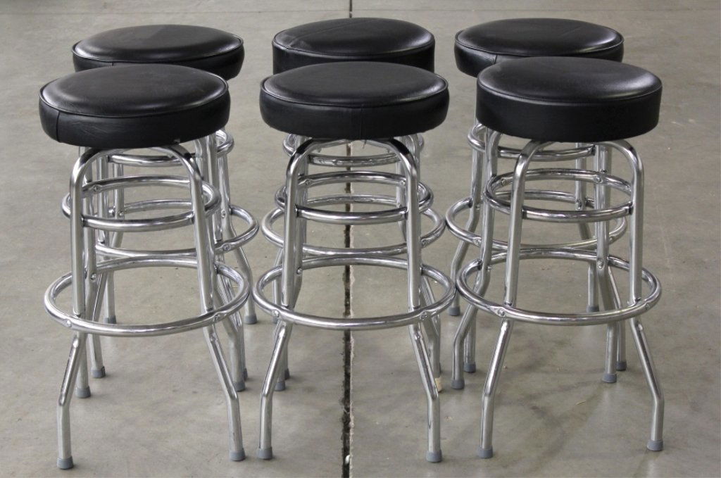 Chrome Bar Stools Set of 6: This lot features 6 bar stools with a black swivel top and chrome legs. These sell as a set for one money. Top of the seat measures 15" diameter, foot measures 16.75" diameter,and the chairs are each