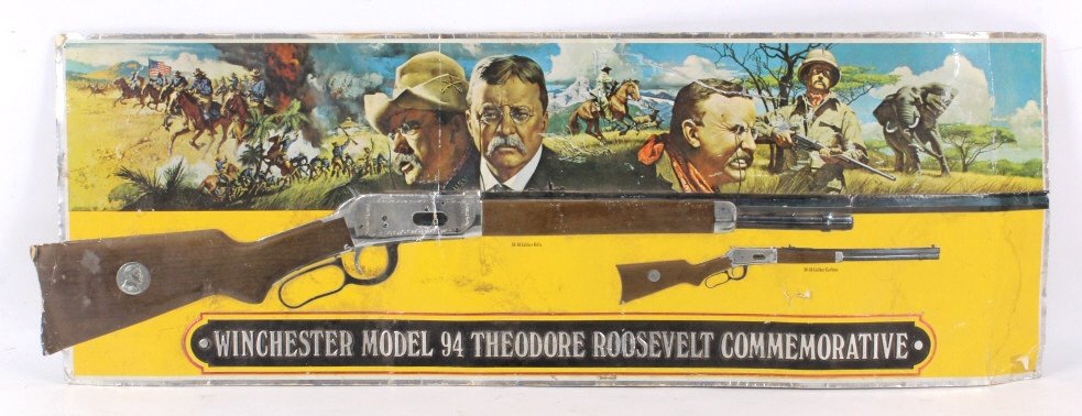 Winchester Model 94 Theodore Roosevelt Sign: This is an original rare cardboard sign for the Winchester Model 94 Theodore Roosevelt Commemorative 30-30 Rifle. The sign shows a fold in the center and edge damage, but is a true original Winchester