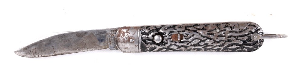 WWII Paratrooper Presto Schrade Switchblade Knife: The knife is marked, "Presto Geo. Schrade Bridgeport." This is a D-22 U.S. WWII M-2 paratrooper knife. The U.S. World War II Airborne knife shows a metal handle with black accents. This is a very rare