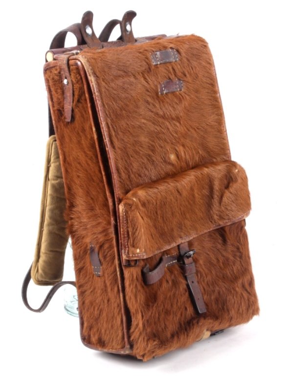 Switzerland Military Horsehide Backpack: This is an original World War II era bag from Switzerland. This bag would have been used by the Mountaineer Military men and is made with great craftsmanship with horsehide, leather, and canvas. The b