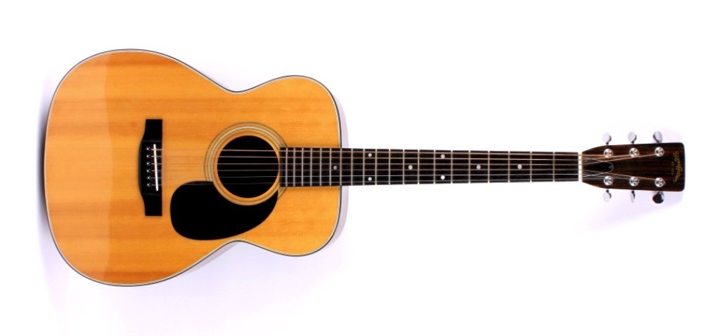 Sigma by Martin Acoustic Guitar GCS-3: This is manufactured by Martin Guitars and is essential a Martin Guitar made in the 1970-1980's. This is in excellent condition and marked on the inside Martin. Measures 39 2/8" long.
