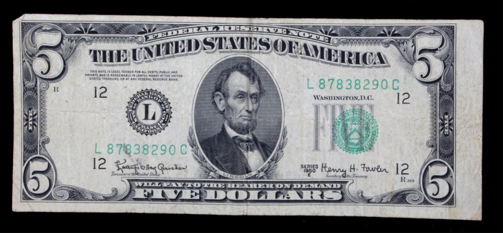U.S. Currency $5 Bill 1950 E Misprint: This is an original 1950 E $5 (five dollar) bill. The bill is rare die to its misprint on the right side. The bill has been mis-cut and across the side and bottom.