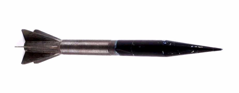 U.S. Armor Piercing (Tank Killer): This item is constructed of metal with a weighted filler. The missile would have been used during military classes to give an example of what a weapon fires. Measures 19" tall with a 3.75" base.