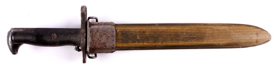 U.S. Army M1 Garand Bayonet: This WWII bayonet is in good condition. The knife fits on the end of an M1 Garand service rifle. The blade is marked U.L. and U. (bomb symbol) L. The hilt is marked with a bomb symbol with U.L. in the