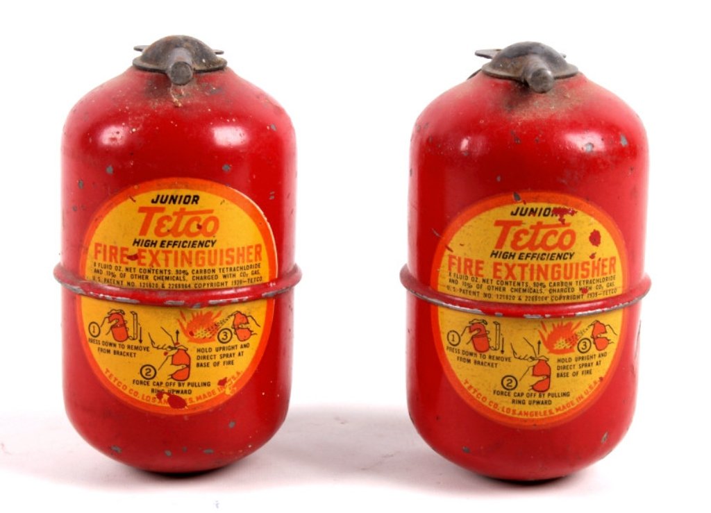 1939 Junior Tetco Fire Extinguisher This is an ori: This is an original handheld fire extinguisher made by Tetco in 1939. The lot features two of the extinguishers for one money. These have not been used and still have the pin. Each measures 4.5"x3"