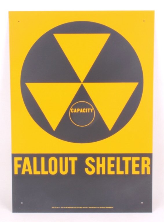 Cold War Era Fallout Shelter sign: This lot features a fallout shelter sign from the 1960's. It is a an original, new old stock sign. At the height of the Cold War, the U.S. and Russia had nuclear weapons pointed at each other. This si