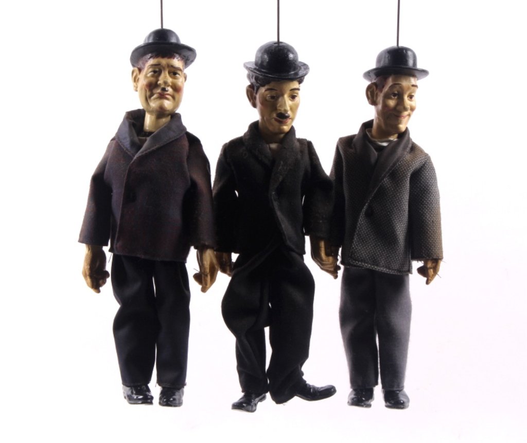 1900-1930 Trio of Marionettes: This lot features 3 early 1900's marionettes. They are believed to be handmade, possibly Eastern European. Each measures approx. 10.25" tall, and 23.25" with the wire and handle.