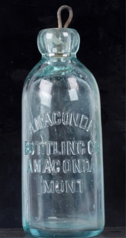 Anaconda Bottling Co. Hutchinson Bottle: This lot includes an Anaconda Montana bottle. It is from the late 1800's. It appears to have been repaired near the heel. It is 2.5" x 6.5".
