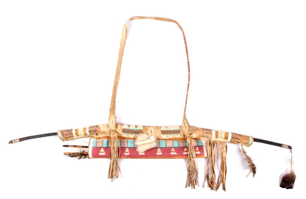 Northern Plains Bow Quiver This features a painted: This features a painted rawhide bow quiver with the bow and arrows handmade from the Northern Plains Native Americans. This piece is believed to be from the Montana region and shows an Indian brain ta