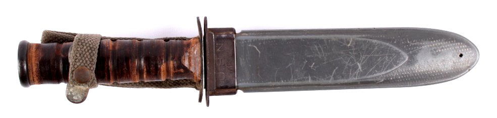 WWII U.S.N. MK 2 Ka-Bar Knife This knife is a Unit: This knife is a United States Nave MK 2 Ka-Bar from WWII. The knife was used during the second world war as an early marine fighting knife. This piece is in good condition. The knife is constructed of