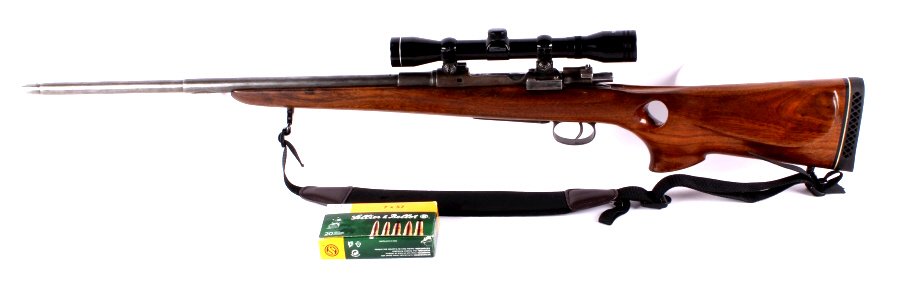 7x57 Mauser Rifle This lot features a 7x57 Mauser: This lot features a 7x57 Mauser rifle. It has a Tasco Pronghorn scope. The rifle is in good condition. Serial #S2***
