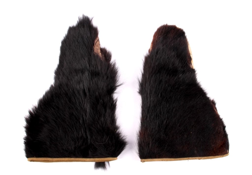 Black Bear Fur Gauntlet Gloves ca. early 1900's Th: The lot features a set of original great condition Black Bear fur and leather gauntlet gloves showing a corduroy calico on the inside. These are from the early 1900's and shows great condition. The co