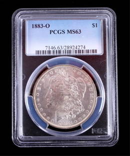 1883-O Morgan Silver Dollar PCGS MS63 This coins w: This coins was struck at the New Orleans Mint in 1883. The coin was graded and sealed by Professional Coin Grading Service and graded at Mint State 63 which means this is an uncirculated
