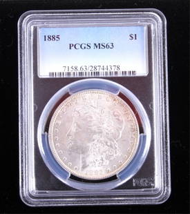 1885-P Morgan Silver Dollar PCGS MS63 This coins w: This coins was struck at the Philadelphia Mint in 1885. The coin was graded and sealed by Professional Coin Grading Service and graded at Mint State 63 which means this is an uncirculated