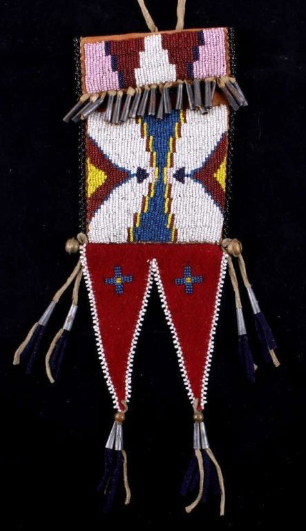 Arapaho Possible Bag circa 1880-1890's This is an: This is an original handmade Arapaho Native American Indian possibles bag. The bag shows tightly hand stitched 18th and 19th century glass trade beads sewn to Indian brain tanned and dyed leather usin