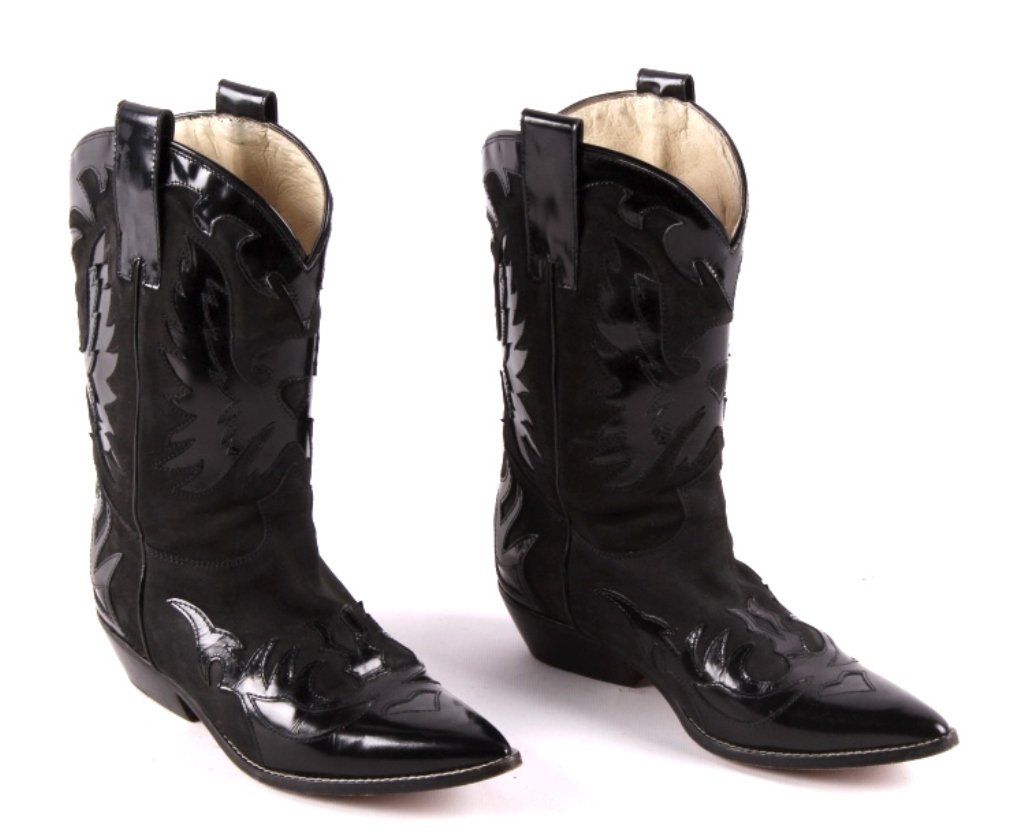 Women's Cowboy Boots by Donald J. Pliner This lot: This lot features a pair of women's cowboy boots. They were made in Italy by Donald J. Pliner. These boots are in excellent condition, showing very little wear. The boots are a size 36 which is a U.S.