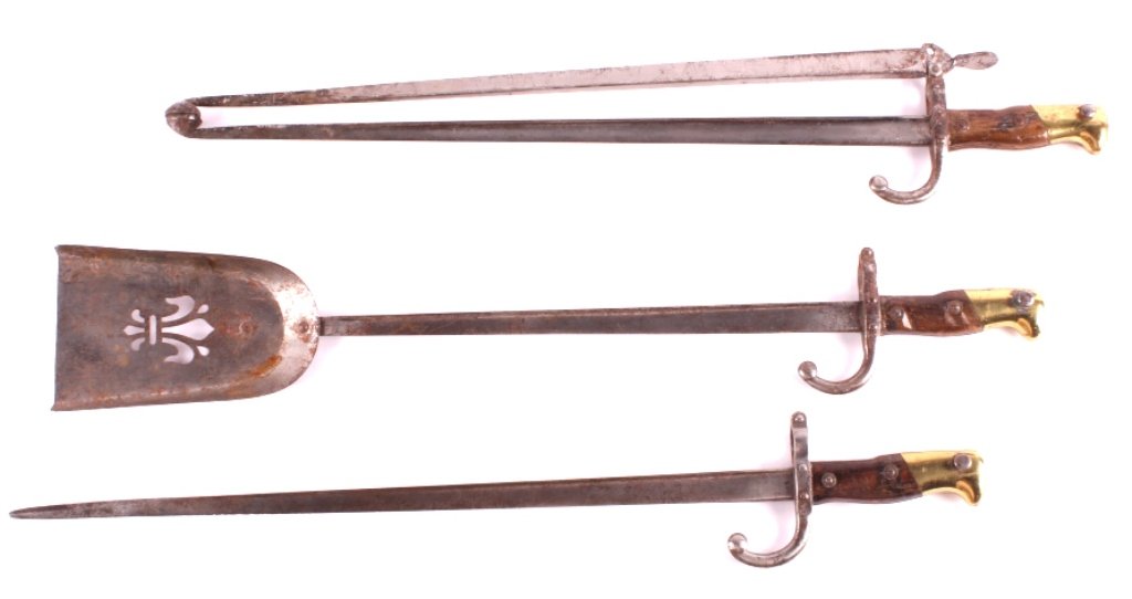 WWI French Bayonets Trench Art This lot includes a: This lot includes a set of fireplace tools made from WWI French bayonets. The tongs, poker, and shovel are all hand made using M1874 bayonets. Each piece is in very good condition. The bayonets measur