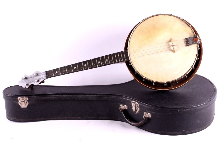 Antique Inlayed Bluegrass Banjo This lot features: This lot features an antique inlayed bluegrass banjo with case. It has a unique inlayed floral design on the back of the pot. The banjo is in good condition. The inlay does show slight damage. The ban