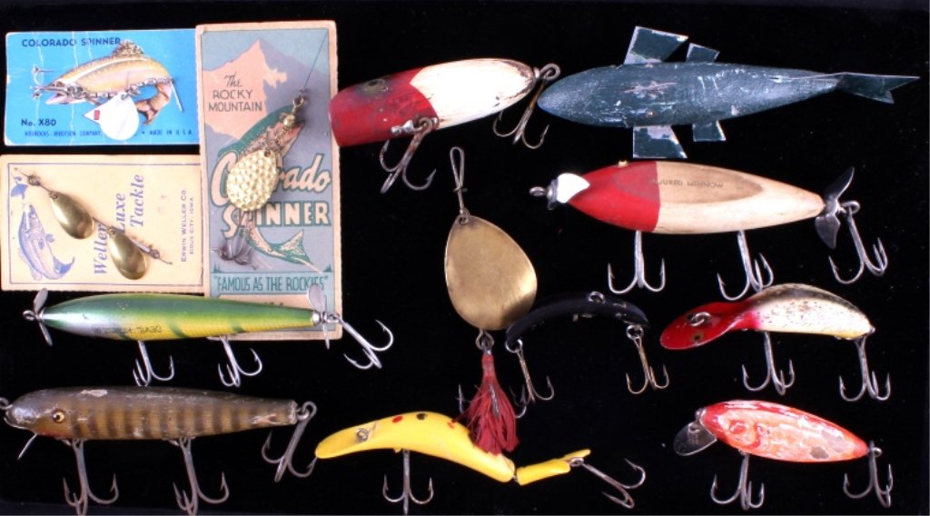 Antique Fishing Lures Collection This lot features: This lot features 12 antique fishing lures and a fish decoy. This collection includes lures made by Pflueger, South Bend, Brooks, and Heddon. The lures and decoy are in good condition, great for any c