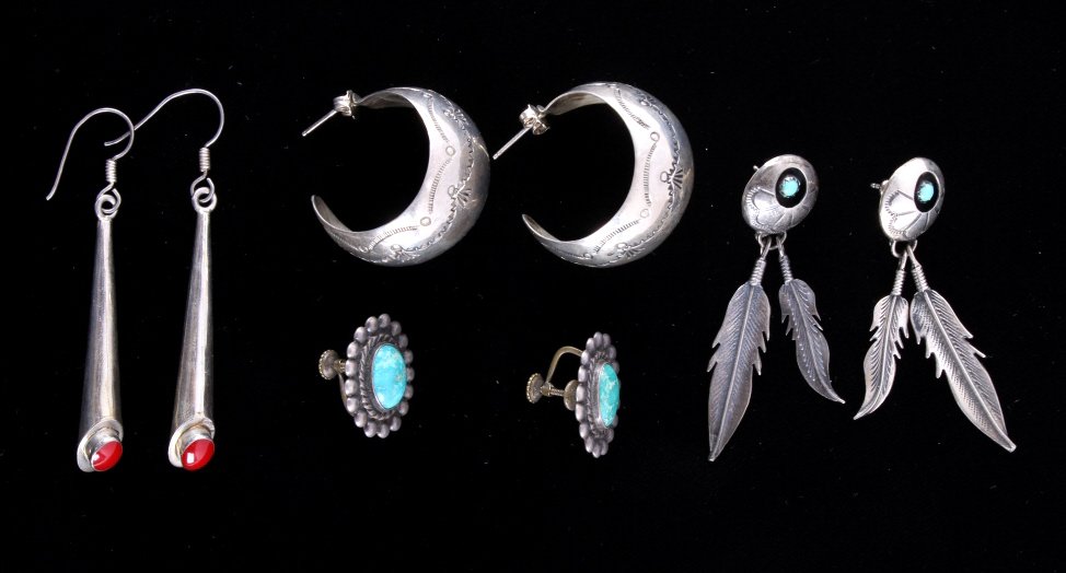 Navajo Indian Sterling Earring Collection The coll: The collection features four sets of hand made Navajo Native American Indian earrings such as: tooled sterling marked and signed (hoop style), .925 marked drop cone style earrings with coral stones, d
