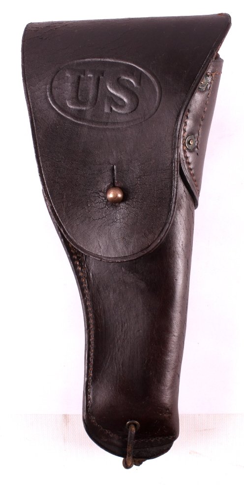 WWI U.S. G & K 1918 Leather Holster This lot featu: This lot features a WWI U.S. G & K leather holster. This is a military issued holster made to carry the Colt 1911 .45 pistol. The holster is marked "US" on the front and "G. & K 1918 A.G." on the back