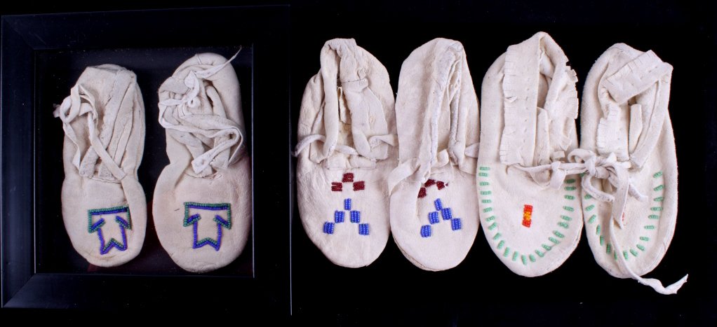 Northern Plains Beaded Children's Moccasins The lo: The lot features three sets of Northern Plains Native American Indian beaded moccasins. The moccasins show a Indian tanned hide with glass trade bead work from the mid 1900's. One is in a frame 8"x8".