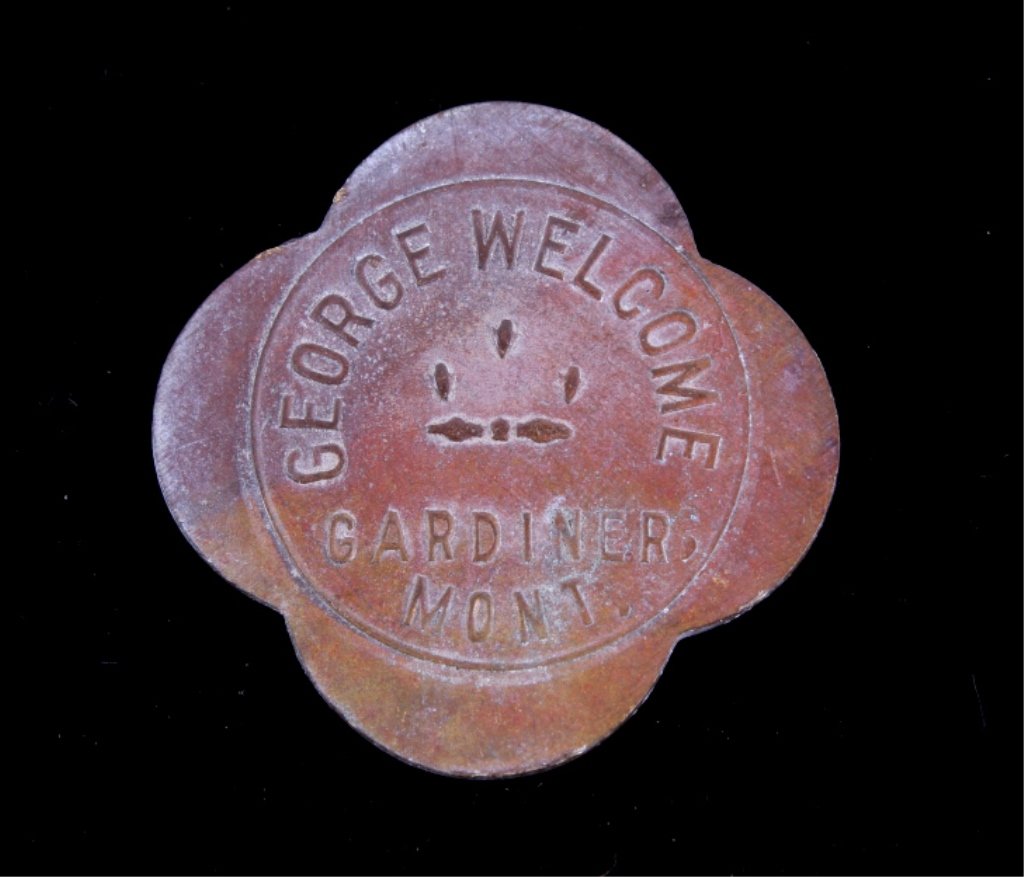 George Welcome Gardiner Montana Yellowstone Token: This is a scarce trade token from Gardiner Montana. The token is a 12 1/2¢ denomination. The token reads "George Welcome Gardiner, Mont." Welcome was a saloon owner and businessman in Gardiner, which