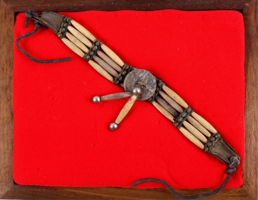 Plains Bone Hair Chocker Necklace circa 1880 This: This is a very rare and early Plains Native American Indian Bone Hair Bead "Choker" Necklace from circa 1880. The piece shows 24 brass trade balls, 20 hair bone beads, and 3 pure silver balls, along w