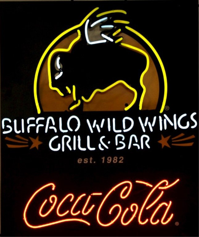 Buffalo Wild Wings Coca Cola Neon Sign This is a r: This is a rare Buffalo Wild Wings Grill & Bar Coca Cola combination advertising neon sign. The sign shows very good condition. This has the outline of the Buffalo Logo and is perfect for a man cave or