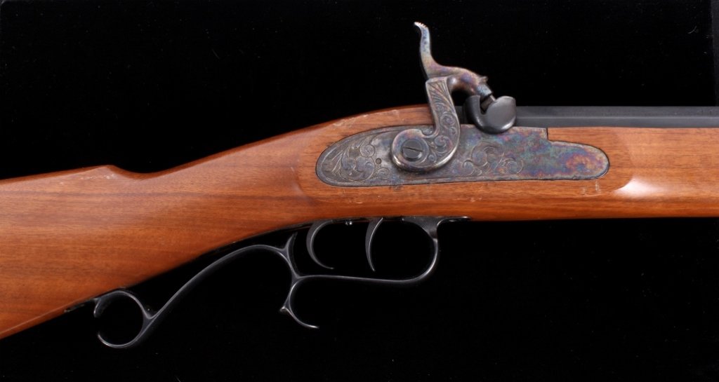 Thompson Center .54 Black Powder Renegade Rifle Th: This is a Thompson Center Arms Rochester, New Hampshire .54 caliber black powder Renegade percussion rifle. This is in very good condition with a few wood dings. Serial number 257031. This has a great