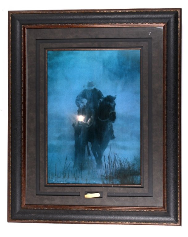 Hero of the Storm by David Stoecklein Cowboy This: This is a print by David Stoeklein called, "Hero of the Storm." The artwork is in an impressive frame and matting measuring 34.5"x42.5". The art shows a rugged cowboy on horse back heading through a s