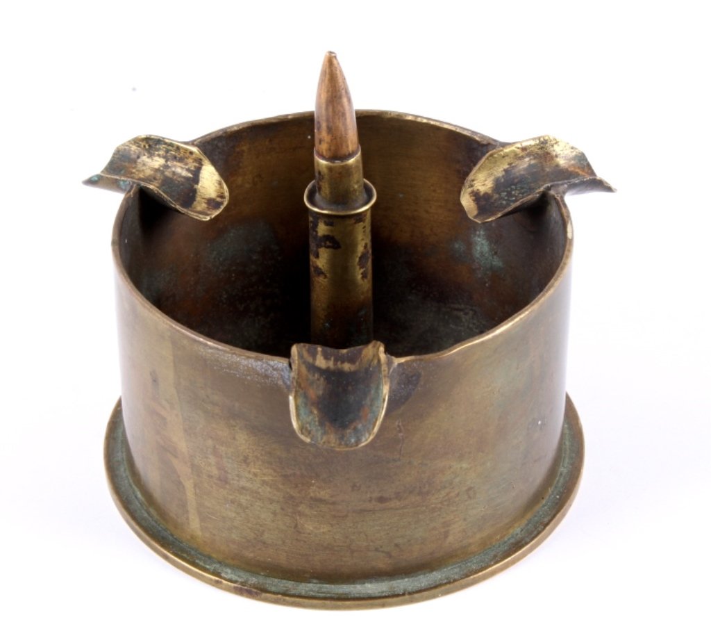 WWII Japanese Trench Art Cigar Ashtray This is a h: This is a handmade piece of World War II trench art cigar ash tray. The piece is made of a Japanese large caliber artillery shell from the Tokyo arsenal and an Arisaka bullet. This piece shows good co