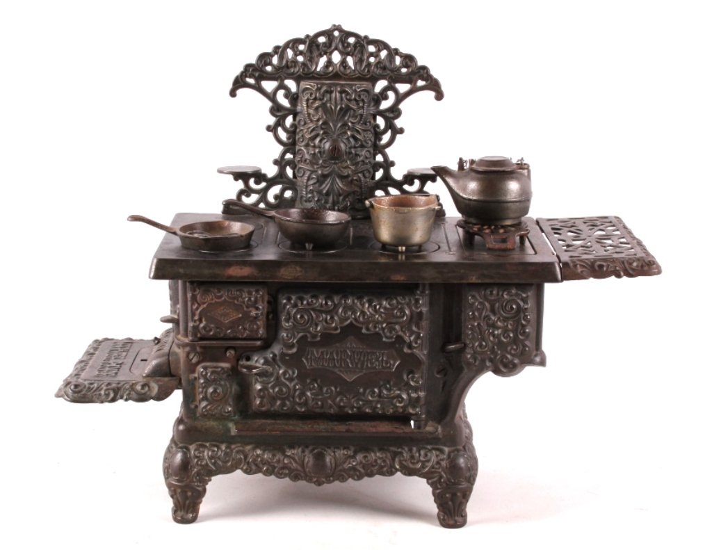 Marvel Salesman Sample Stove by Kenton 1905 This i: This is a rare original salesman sample cast iron embossed stove manufactured by Kenton circa 1905. The rare piece is the Marvel Range model showing wonderful cast iron swirl designs and is all comple