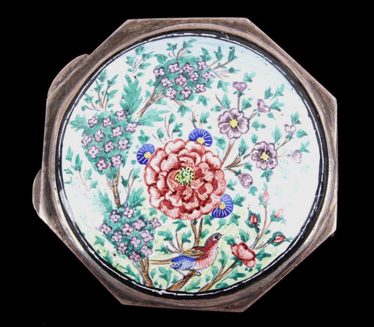 Antique Persian Porcelain Silver Pill Box This is: This is a hand crafted piece showing a hinged pill box with hand painted ceramic. One sides shows a Persian palace and the other a intricate floral design. The inside shows a matching painted flower. 